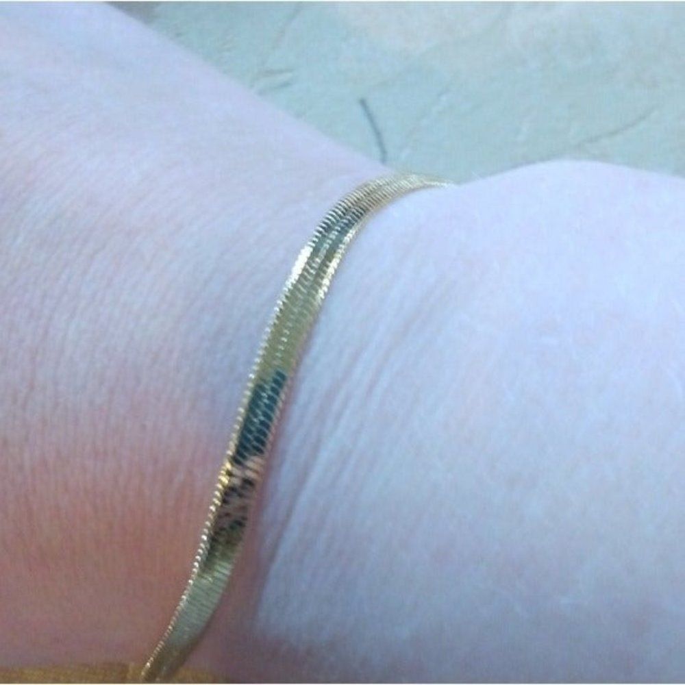 14kt Italy stamped gold Bonded herringbone swanky bracelet Plus Sized.