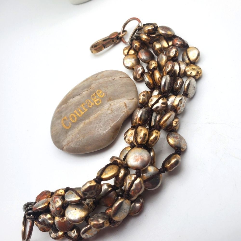 Lucky brand pebble gold toned champagne bracelet