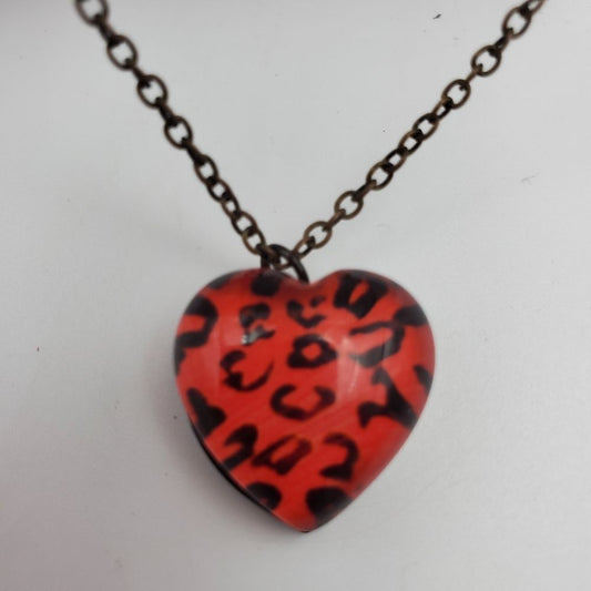 Zebra red Kool aid heart necklace
